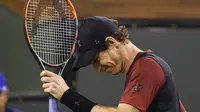 Andy Murray dikalahkan Vasek Pospisil 4-6, 6-7(5) pada babak kedua BNP Paribas Open 2017, Indian Wells, Minggu (12/3/2017) siang WIB. (AP Photo/Mark J. Terrill)