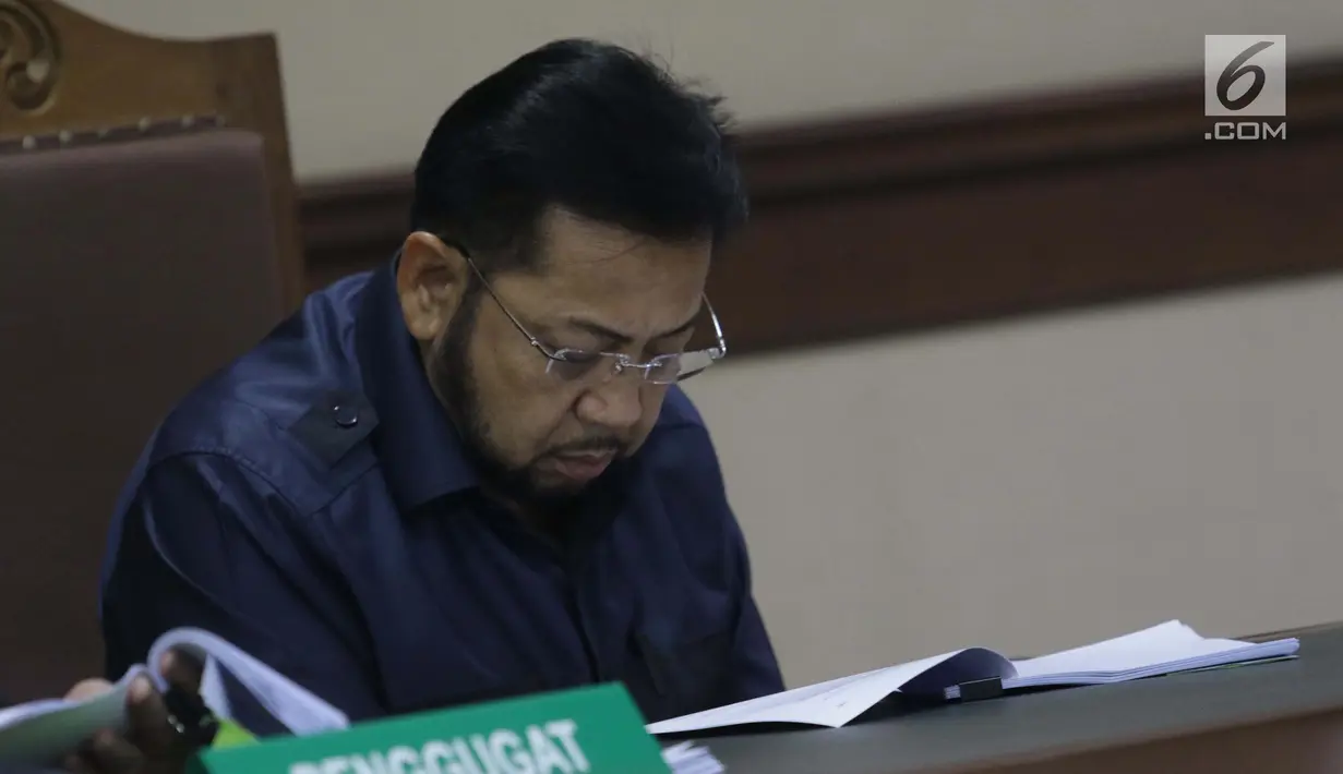 Terpidana kasus korupsi pengadaan e-KTP, Setya Novanto saat mengikuti sidang pengajuan permohonan peninjauan kembali (PK) ke Mahkamah Agung di Pengadilan Negeri Jakarta Pusat, Rabu (28/8/2019). Sidang beragendakan pembacaan nota permohonan peninjauan kembali. (Liputan6.com/Helmi Fithriansyah)