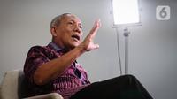 Mantan Direktur Penyakit Menular WHO South-East Asia Regional Office (SEARO), Profesor Tjandra Yoga Aditama saat wawancara khusus dengan Liputan6.com di Jakarta, Rabu (8/1/2025). (Liputan6.com/Angga Yuniar)