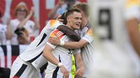Penyerang Jerman Florian Wirtz merayakan gol ke gawang Spanyol pada laga perempat final Euro 2024 di Stuttgart Arena (AP)