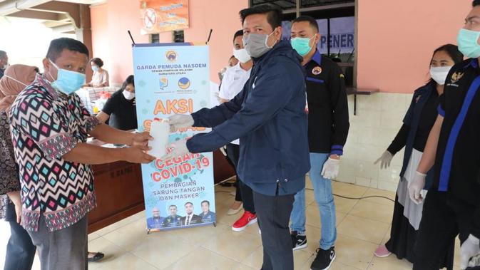 Nasdem Kerja Kemanusiaan Bagikan 250 Ribu Masker Cegah Penyebaran Covid 19 News Liputan6 Com