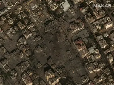 Gambar ini disediakan oleh Maxar Technologies, menunjukkan bangunan tempat tinggal yang hancur di Kota Gaza, Selasa (10/10/2023). Pesawat-pesawat tempur Israel membombardir Jalur Gaza sebagai pembalasan atas serangan akhir pekan yang dilakukan Hamas, di tengah meningkatnya kekhawatiran mengenai warga sipil yang terjebak dalam pertempuran tersebut. (Satellite image ©2023 Maxar Technologies via AP)