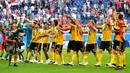 Para peman timnas Belgia menyapa para suporter usai melawan Inggris pada pertandingan memperebutkan juara tiga Piala Dunia 2018 di Stadion St. Petersburg di St. Petersburg, Rusia, (14/7). Belgia menang 2-0 atas Inggris. (AFP Photo/Giuseppe Cacace)