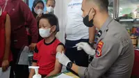Vaksinasi di SDN Paccinang dan SDN Paccinang 1 Kota Makassar (Liputan6.com/Fauzan)