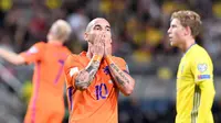 Reaksi gelandang tim nasional Belanda, Wesley Sneijder, saat menghadapi Swedia, pada laga Kualifikasi Piala Dunia 2018, di Solna, Selasa atau Rabu (7/9/2016). (AFP/Jonathan Nackstrand). 