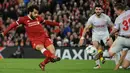 Pemain Liverpool, Mohamed Salah berhasil mencetak gol ke gawang Spartak Moscow pada matchday terakhir Grup E Liga Champions di Stadion Anfield, Kamis (7/12). Liverpool menang 7-0 dan lolos ke babak 16 besar. (AP/Rui Vieira)