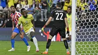 Timnas Brasil meraih kemenangan 4-1 atas Timnas Paraguay pada laga kedua Grup D Copa America 2024 di Allegiant Stadium, Las Vegas, Nevada, Sabtu (29/6/024) pagi WIB. Vinicius Junior tampil moncer dengan menyumbangkan dua gol. (AP Photo/David Becker)