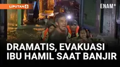 Seorang ibu hamil dievakuasi dengan ban pelampung dari rumahnya yang terendam banjir setinggi dua meter di Kebon Pala, Jatinegara, Minggu malam. Petugas gabungan Satpol PP, TNI, dan Polri bergerak cepat membawa korban ke rumah sakit.