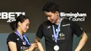 Pebulu tangkis ganda campuran Jepang, Seo Seung Jae/Chae Yu Yung menjadi runner up setelah dikalahkan pasangan China, Zheng Si Wei/Huang Ya Qiong pada laga final All England 2023 di Utilita Arena, Birmingham, Inggris, 19 Maret 2023. Seo/Chae kalah dengan skor 16-21, 21-16, 12-21. Walaupun begitu, mereka sukses naik ke peringkat top 5 dunia. (AP Photo/Rui Vieira)