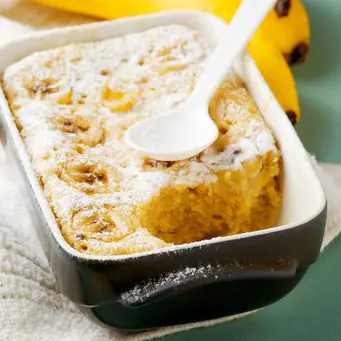 Resep Puding Santan Pisang Roti Tawar Lembut./Copyright depositphotos.com/zoryanchik