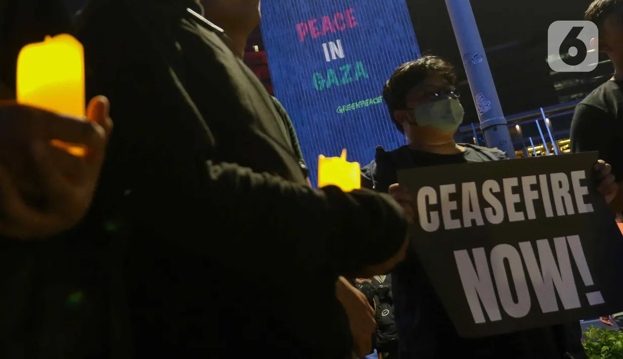 Aksi ini digelar sebagai bentuk dukungan kepada rakyat Palestina yang menghadapi serangan-serangan brutal Israel. (Liputan6.com/Herman Zakharia)