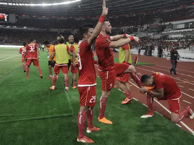 Striker Persija Jakarta, Marko Simic berselebrasi setelah membobol ke gawang Bali United pada final Piala Presiden di Stadion Utama GBK, Senayan, Jakarta, Sabtu (17/2). Persija Jakarta sementara unggul 2-0 atas Bali United. (Liputan6.com/Arya Manggala)