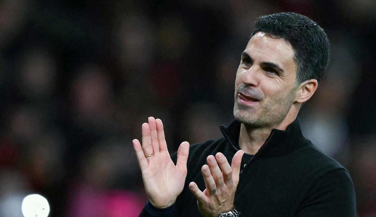 Hasil ini membuat Arsenal semakin dekat dengan gelar juara Liga Inggris musim ini. Pasukan Mikel Arteta kini kukuh di puncak klasemen dengan 82 poin dari 37 pertandingan. (AFP/Glyn Kirk)