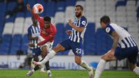 Striker Manchester United, Marcus Rashford, melepaskan tendangan ke arah gawang Brighton pada laga Premier League pekan ke-32 di Stadion Falmer, Rabu (1/7/2020) dini hari WIB. Manchester United menang 3-0 atas Brighton. (AFP/Mike Hewitt/pool)