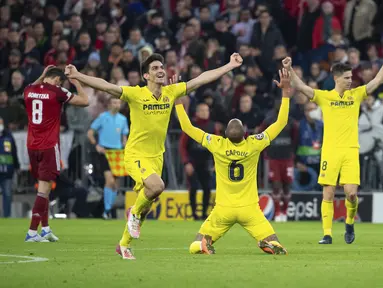 Para pemain Villareal merayakan berakhirnya pertandingan leg kedua perempat final Liga Champions melawan Bayern Munchen di Allianz Arena, Munich, Jerman, 12 April 2022. Pertandingan berakhir imbang 1-1. (Sven Hoppe/DPA via AP)