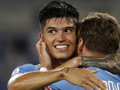 Penyerang Lazio, Joaquin Correa, merayakan gol yang dicetaknya ke gawang Brescia pada laga lanjutan Serie A pekan ke-37 di Stadion Olimpico, Kamis (30/7/2020) dini hari WIB. Lazio menang 2-0 atas Brescia. (AP Photo/Riccardo De Luca)