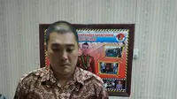 Burhan, yang merupakan pengusaha ditahan polisi dan menjadi tersangka kebakaran pabrik korek api gas di Langkat. (Liputan6.com/Reza Efendi)