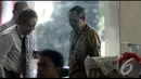 Muhadi menjalani pemeriksaan hampir delapan jam menyangkut kasus yang sudah menjerat Gubernur Banten, Ratu Atut Chosiyah, Jakarta, Jumat (21/8/2014) (Liputan6.com/Panji Diksana)