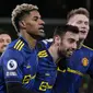 Manchester United semakin menjauh dengan unggul 3-0 pada menit ke-77. Marcus Rashford yang baru dimasukkan pada menit ke-71 menggantikan Mason Greenwood berhasil mencetak gol usai menerima umpan pendek Bruno Fernandes. (AP/Matt Dunham)