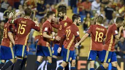 Spanyol lolos ke putaran fina Piala Dunia 2018 sebagai juara grup G dengan raihan 28 poin. Spanyol unggul lima poin dari Italia di peringkat kedua. (AFP/Jose Jordan)