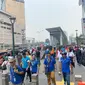 Para partisipan yang mengikuti peluncuran "Enjoy Jakarta Walking Tour" pada Jumat (11/10/2019) yang dilaksanakan dengan berjalan dari Gedung Sarinah hingga Terowongan Kendal, Jakarta Pusat. (dok. Liputan6.com/Novi Thedora)