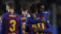 Lionel Messi dan Ousmane Dembele sama-sama menyumbang gol saat mengalahkan Celta Vigo dalam laga lanjutan La Liga, di Camp Nou, Sabtu (22/12/2018) malam waktu setempat. (AP Photo/Manu Fernandez)
