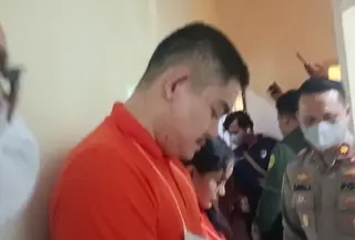 Tersangka kasus pembunuhan calon LC di Batam. (Liputan6.com/Ajang Nurdin)