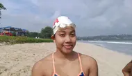 Perenang Indonesia, I Gusti Ayu Made Nadya Saraswati, yang turun di nomor 10K putri baru selesai melakukan test venue di Pantai Jimbaran, Bali, Jumat (12/6/2026), menjelang Kejuaraan Renang 12th Asian Open Water Swimming Championship 2026. (Bola.com/Alit Binawan)