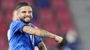 Pemain Italia, Lorenzo Insigne, melakukan selebrasi usai mencetak gol ke gawang Republik Ceko pada laga uji coba di Stadion di Reanto Dall'Ara, Sabtu (5/6/2021). Italia menang dengan skor 4-0. (AP/Antonio Calanni)