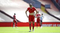 Pemain Liverpool Fabinho bereaksi pada akhir laga melawan Newcastle United pada pertandingan Liga Inggris di Stadion Anfield, Liverpool, Inggris, Sabtu (24/4/2021). Pertandingan berakhir imbang 1-1. (David Klein, Pool via AP)