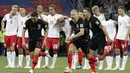 Ekspresi pemain Kroasia setelah mengalahkan Denmark pada laga 16 besar Piala Dunia 2018 di Nizhny Novgorod Stadium, Rusia, (1/7/2018). Kroasia menang 3-2 lewat adu penalti. (AP/Gregorio Borgia)