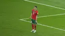 Pemain Maroko, Achraf Hakimi, melakukan selebrasi ala Pinguin usai mencetak gol ke gawang Spanyol pada laga 16 besar Piala Dunia 2022 di Stadion Education City, Selasa (6/12/2022). (AP/Ricardo Mazalan)
