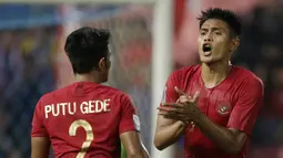 Fachruddin Aryanto merupakan bek tengah andalan Shin Tae-yong saat Timnas Indonesia menjadi runner-up Piala AFF 2020. Pengalaman dan kepemimpinan pemain Madura United itu juga akan memperkukuh barisan pertahanan Timnas Indonesia U-23 untuk mengarungi SEA Games 2021. (Bola.com/M Iqbal Ichsan)