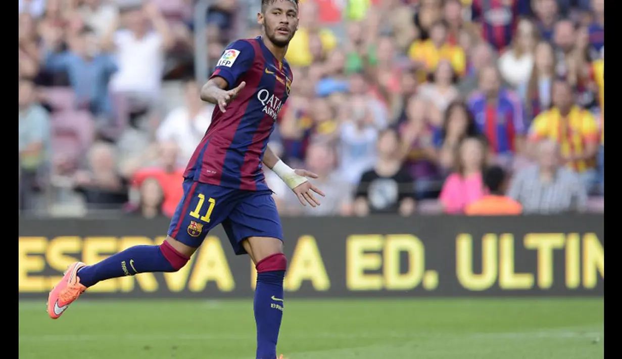 Selebrasi pemain depan Barcelona, Neymar da Silva (kanan), saat merayakan golnya ke gawang Granada di Stadion Camp Nou, (27/9/2014). (AFP PHOTO/Josep Lago)