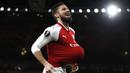 Striker Arsenal, Olivier Giroud, melakukan selebrasi usai mencetak gol ke gawang BATE Borisov pada laga Liga Europa di Stadion Emirates, Jumat (8/12/2017). Arsenal menang 6-0 atas BATE Borisov. (AP/Kirsty Wigglesworth)