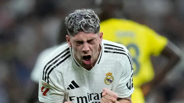 Selebrasi Federico Valverde dalam laga La Liga antara Real Madrid vs Villarreal, Minggu (6/10/2024). (c) AP Photo/Bernat Armangue