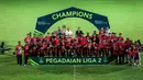 <p>Selebrasi skuad Semen Padang merayakan keberhasilan menjadi runner-up Pegadaian Liga 2 2023/2024 setelah dikalahkan PSBS Biak dengan agregat 0-6 pada laga final Pegadaian Liga 2 2023/2024 di di Stadion GOR Haji Agus Salim, Padang, Sabtu (9/3/2024). (Bola.com/Bagaskara Lazuardi)</p>