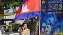 Cuaca panas tidak menyurutkan semangat penonton untuk hadir menyaksikan upacara pembukaan Pesta Olahraga Asia Tenggara (SEA Games) ke-32 Kamboja di Phnom Penh. (NHAC NGUYEN/AFP)