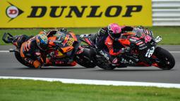 Podium ketiga MotoGP Inggris ditempati rider Red Bull KTM Brad Binder. Miguel Oliveira dari RNF Aprilia finis keempat dalam balapan yang berlangsung 20 lap. (AP Photo/Rui Vieira)