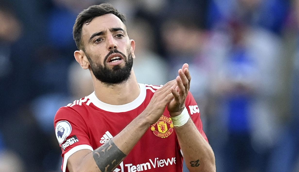 Kualtias Bruno Fernandes tak perlu diragukan lagi. Ia merupakan metronom sekaigus motor serang di lini tengah MU. Sejauh ini, Fernandes tercatat telah mencetak 49 gol dan 39 assist dalam 117 penampilannya di seluruh ajang. (AFP/Paul Ellis)