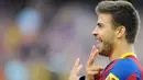 Kegembiraan defender Barcelona Gerard Pique seusai menjebol gawang Espanyol dalam lanjutan La Liga yang digelar di Nou Camp Stadium, 8 Mei 2011. Barca unggul 2-0. AFP PHOTO / LLUIS GENE