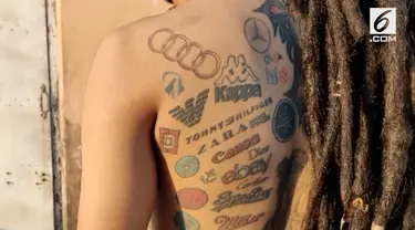 Seorang seniman tato India mengabadikan 442 logo perusahaan dalam bentuk tato di tubuhnya.