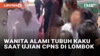 Insiden terjadi saat ujian CPNS di Lombok, Nusa Tenggara Barat. Seorang wanita peserta ujian tiba-tiba alami tubuh kaku seperti patung saat antre. Diduga wanita tersebut alami Psikosomatis hingga harus dievakuasi oleh petugas yang berjaga.