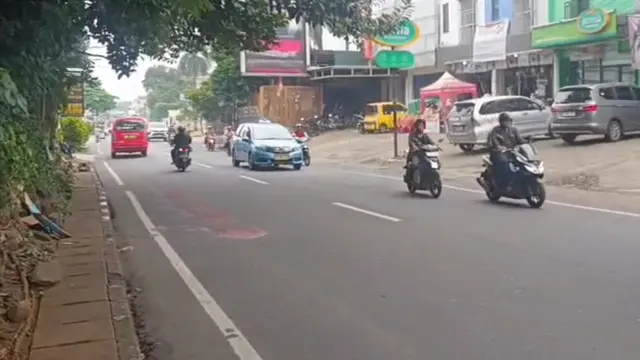 Lokasi laka lantas antara pengendara sepeda motor dengan BisKITA di Jalan Raya Siliwangi, Depok.