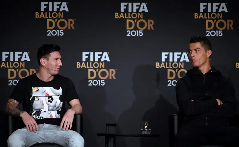 Bintang Barcelona Lionel Messi dan Bintang Real Madrid Cristiano Ronaldo. (AFP/Olivier Morin)