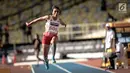 Atlet Lompat Jauh Indonesia, Maria Natalia Londa saat beraksi dalam laga nomor triple jump putri SEA Games di Stadium Bukit Jalil, Malaysia, Rabu (23/8). Maria Natalia Londa berhasil meraih medali perak. (Liputan6.com/Faizal Fanani)