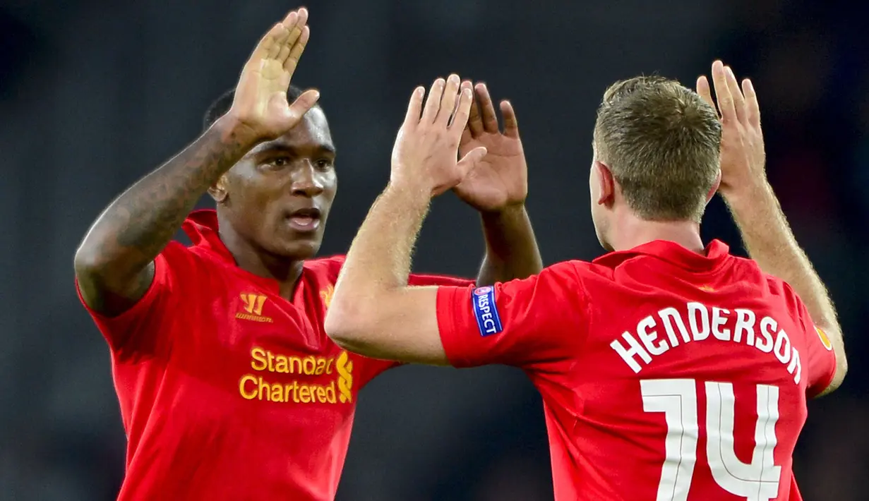 Bek kanan Inggris, Andre Wisdom yang kini tengah menjalani musim pertama bersama Warrington Town, klub yang berlaga di kasta keenam sepak bola Inggris ini tercatat pernah berseragam Liverpool selama 5 musim mulai 2012/2013 hingga 2016/2017. Total tampil 22 kali bersama The Reds di semua kompetisi, ia sukses mencetak 1 gol dan 2 assist, termasuk satu gol di Liga Europa 2012/2013 saat Liverpool menang 5-3 atas tuan rumah BSC Young Boys pada laga pertama fase Grup A (20/9/2012). Gol tersebut dicetaknya saat berusia 19 tahun, 4 bulan dan 11 hari yang menahbiskannya sebagai pencetak gol termuda kedua Liverpool di ajang Liga Europa. (AFP/Fabrice Coffrini)