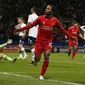 Pemain Liverpool Raheem Sterling saat merayakan golnya ke gawang Bolton (Reuters)