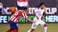 Takefusa Kubo saat beraksi untuk Real Madrid lawan Atletico (Johannes EISELE / AFP)