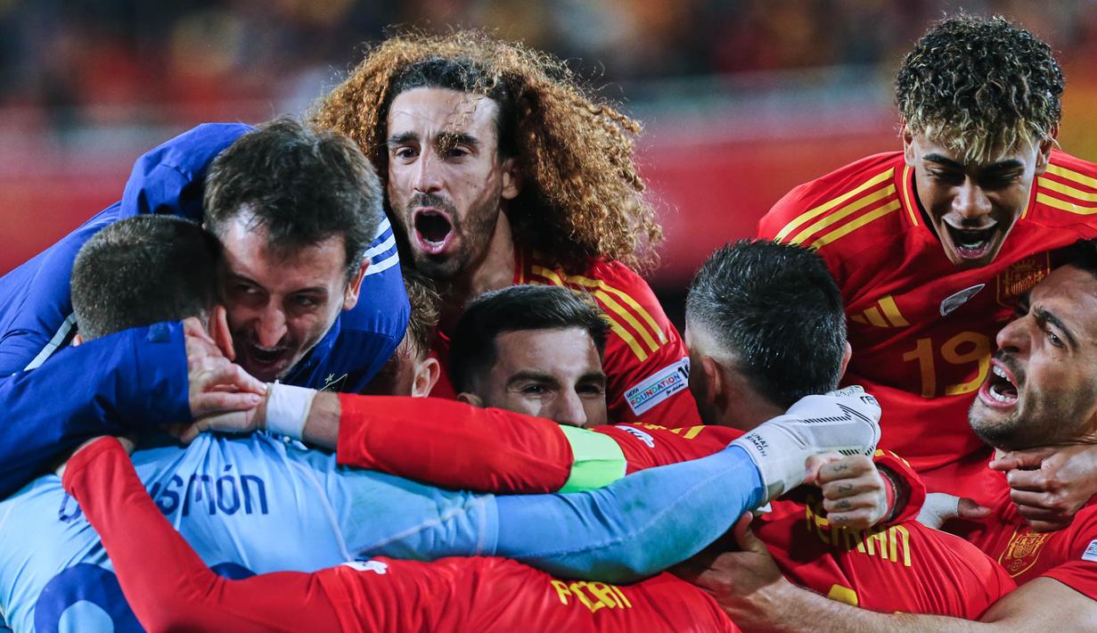 Laga ini berakhir imbang dengan agraget 5-5. Spanyol kemudian menang dengan skor 5-4 di babak adu penalti dan meraih tiket ke babak semifinal. (AP Photo/Alberto Saiz)